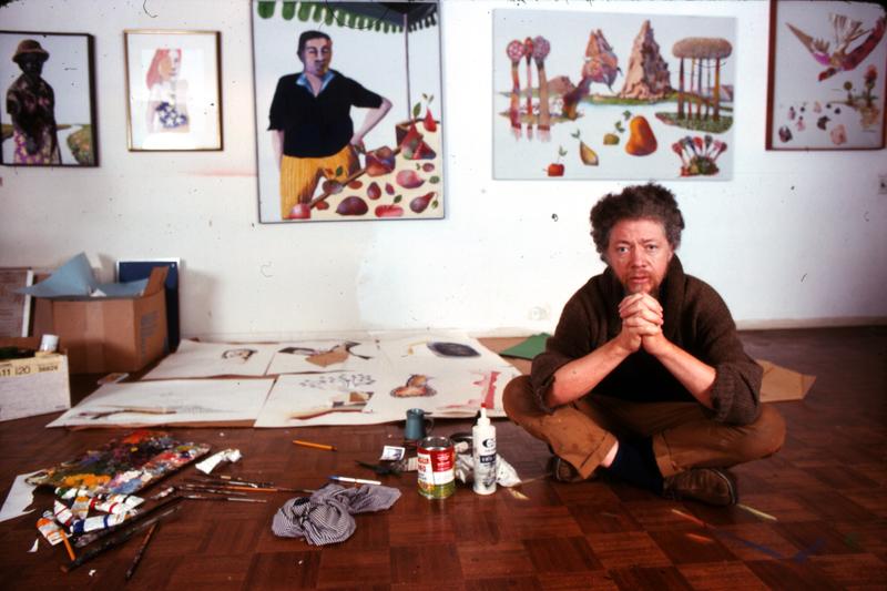Portrait of American artist Benny Andrews (1930 - 2006) as he sits on the floor of his studio, New York, 1970s.