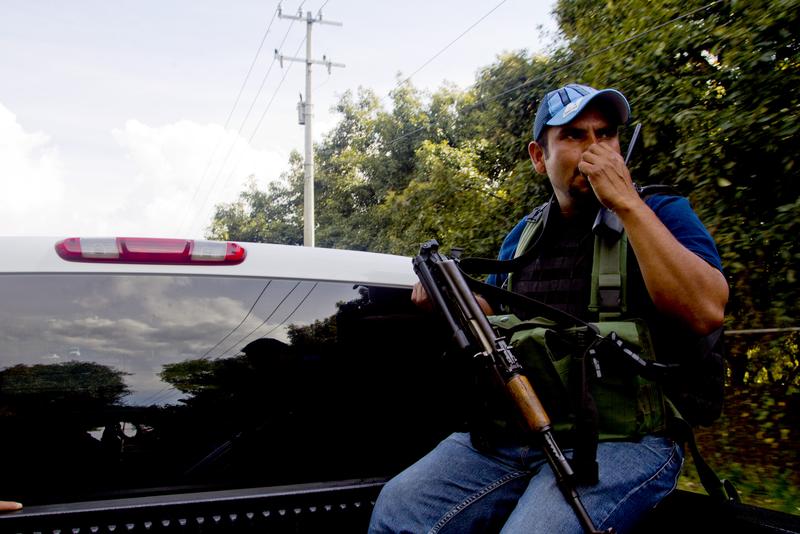 An armed member of the citizens' self-protection police patrol in Tancitaro community, state of Michoacan, Mexico, on January 16, 2014.