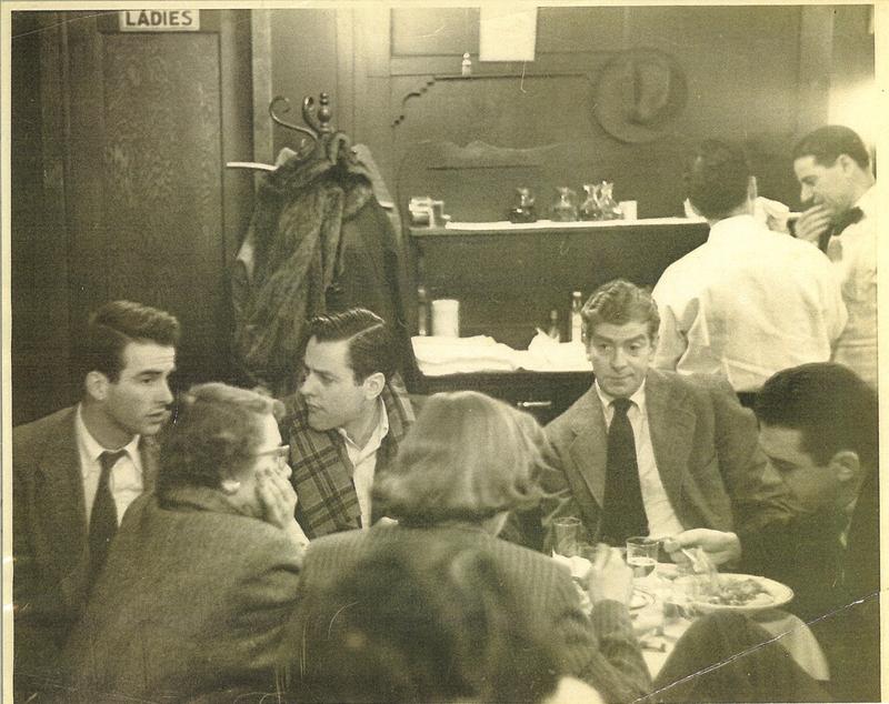 Regulars at the San Remo Café. Writer Jack Kerouac sits on the far right.