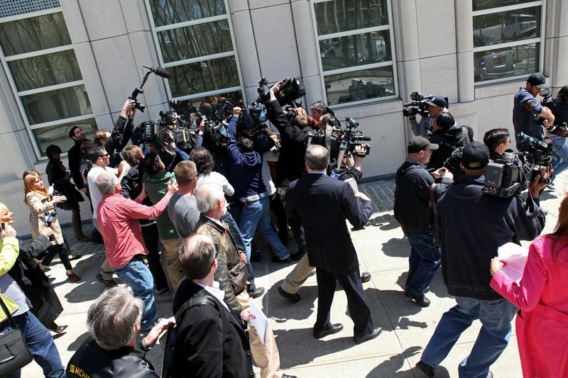 Staten Island congressman Michael Grimm is mobbed by reporters following his arraignment on federal fraud charges in Brooklyn. Grimm denies the allegations in the 20-count federal indictment.