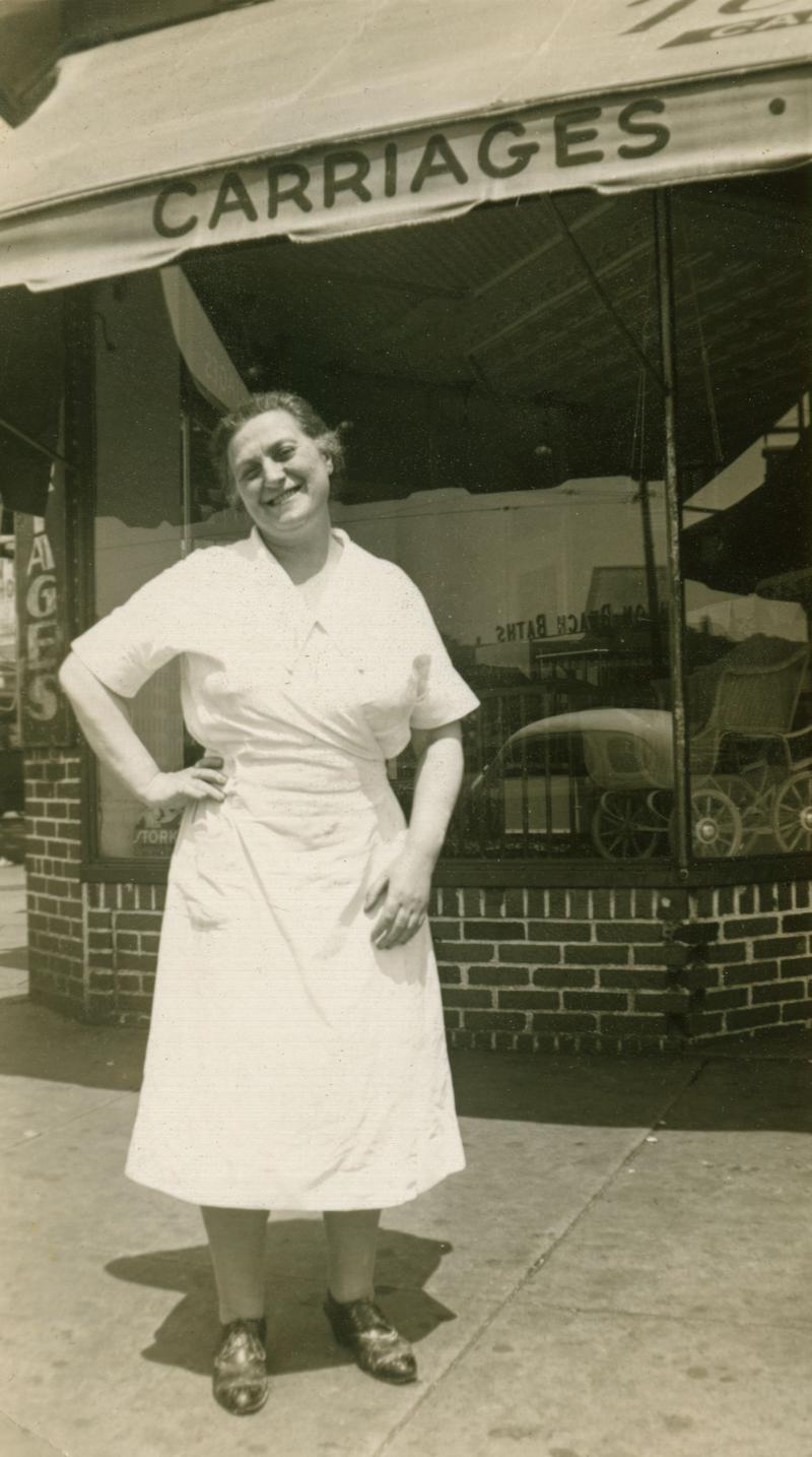 Mrs. Stahl on the corner of Brighton Beach and Coney Island Avenues, near her shop, circa 1940s.