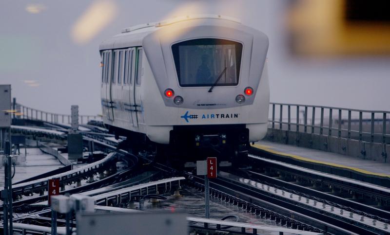 AirTrain rail service exits a station at JFK Airport in New York City.