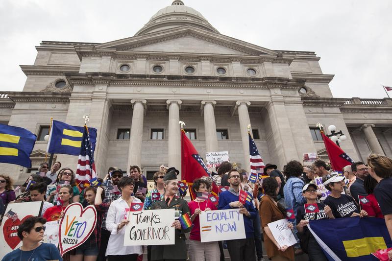 Demonstrators gather on the steps of the Arkansas State Capital in Little Rock during a press conference by the Human Rights Campaign following Gov. Asa Hutchinson's comments on House Bill 1228.