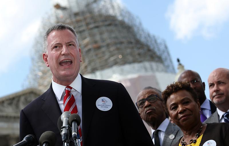 Mayor Bill de Blasio (L) speaks outside the U.S. Capitol May 12, 2015 in Washington, DC. De Blasio called for a 'progressive agenda to combat income inequality.'