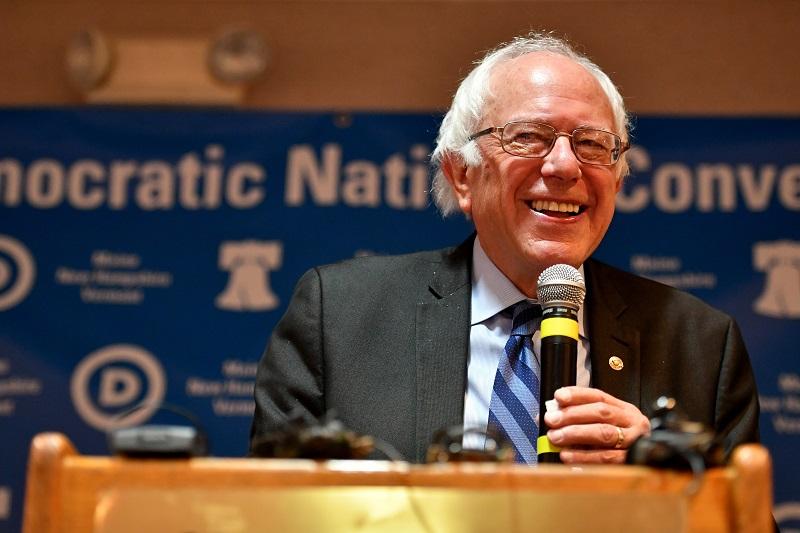 Senator Bernie Sanders exits the stage after addressing the New Hampshire, Maine and Vermont delegation breakfast at the Democratic National Convention (DNC) on July 27, 2016 in Essington, Penn.