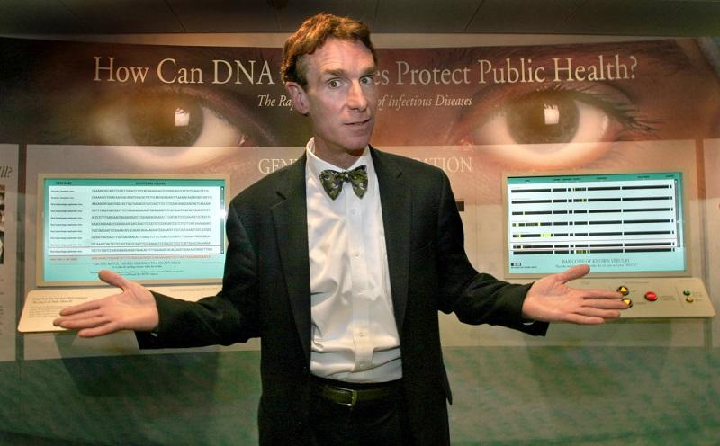 Bill Nye ('the Science guy') in front of a display showing how DNA research uncovered the SARS virus at the Marian Koshland Science Museum of the National Academy of Sciences.