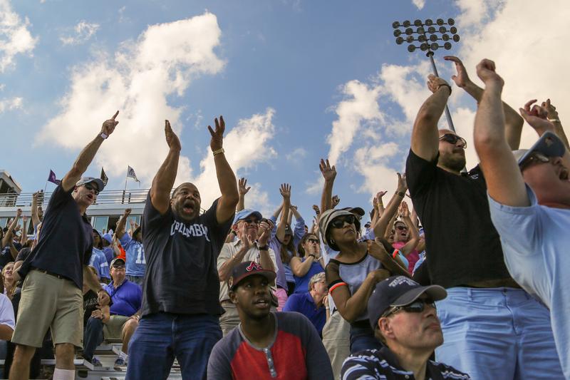 Columbia football fans, most of them alumni or parents of players, root for the Lions in Saturday's season opener at Fordham.
