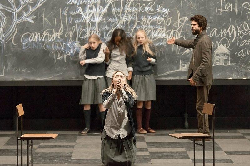 Saoirse Ronan (foreground), Elizabeth Teeter, Ashlei Sharpe Chestnut, Erin Wilhelmi and Ben Whishaw (Background) in a scene from Arthur Miller's "The Crucible," directed by Ivo van Hove.