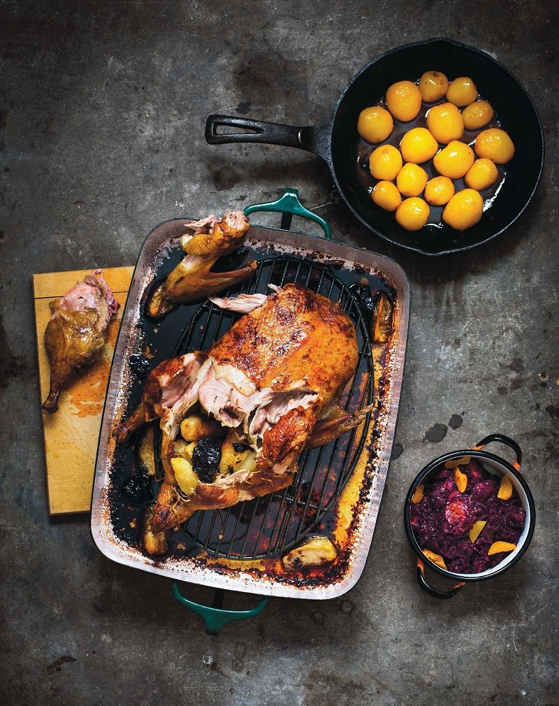 Roasted duck with apples and prunes.