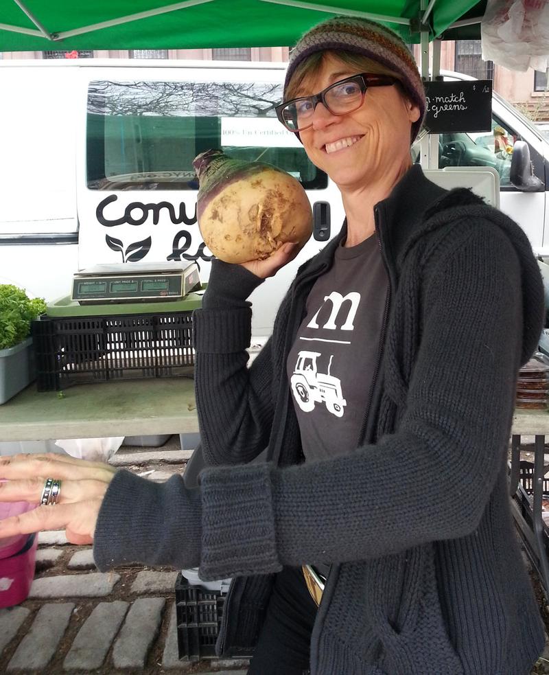 Amy Eddings getting ready to heave a rutabaga like a shot put.