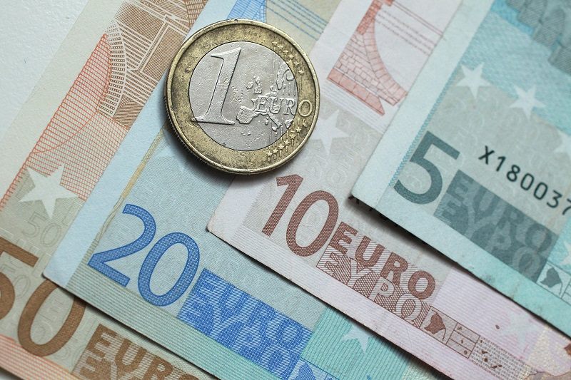 In this photo illustration, a one Euro coin lies on Euro currency bills on June 21, 2011 in Berlin, Germany.