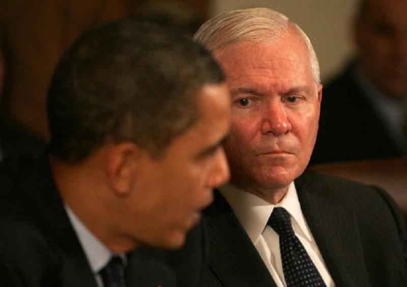 Secretary of Defense Robert Gates listens as U.S. President Barack Obama (left) speaks at a cabinet meeting at the White House on November 23, 2009 in Washington, DC.