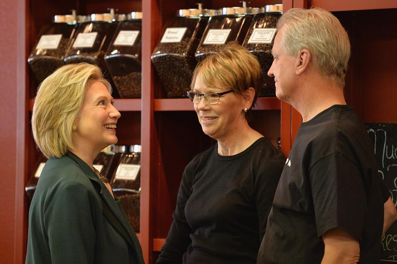 Democratic Presidential hopeful and former US Secretary of State, Hillary Clinton greets JP and Jennifer Howard, owners of Tremont Grille.