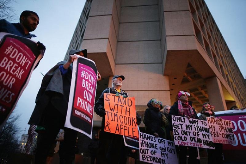 Organized by Fight for the Future, about a dozen protestors demonstrate outside the Federal Bureau of Investigation's J. Edgar Hoover headquarters in support of Apple.
