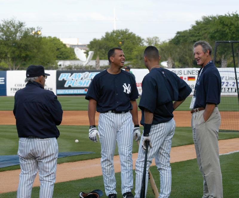 Former catcher and manager Yogi Berra #8, thirdbaseman Alex Rodriguez #13, shortstop Derek Jeter #2, of the New York Yankees, speak with commentator and former pitcher Jim Kaat, from the YES Network.