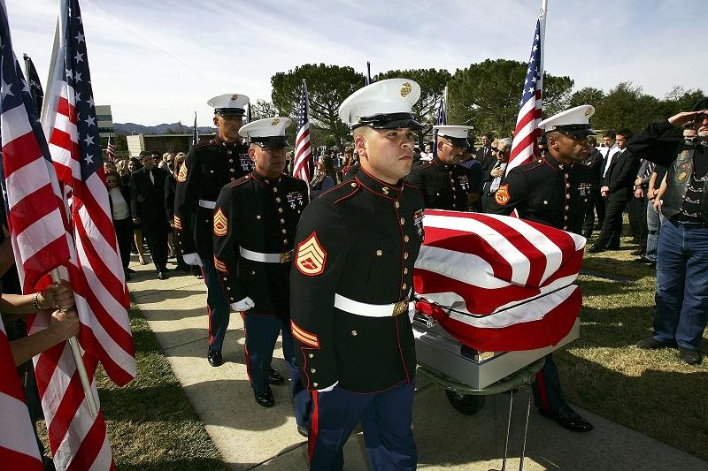 U.S. Marines carry the casket at a memorial service for U.S. Marine Lance Cpl. Anthony Melia on February 5, 2007 in Westlake Village, California. Melia was killed in combat in Al Anbar province.