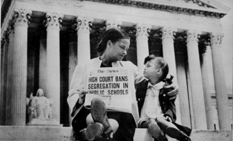 Mother and child on steps of Supreme Court following Brown v. Board of Education decision.