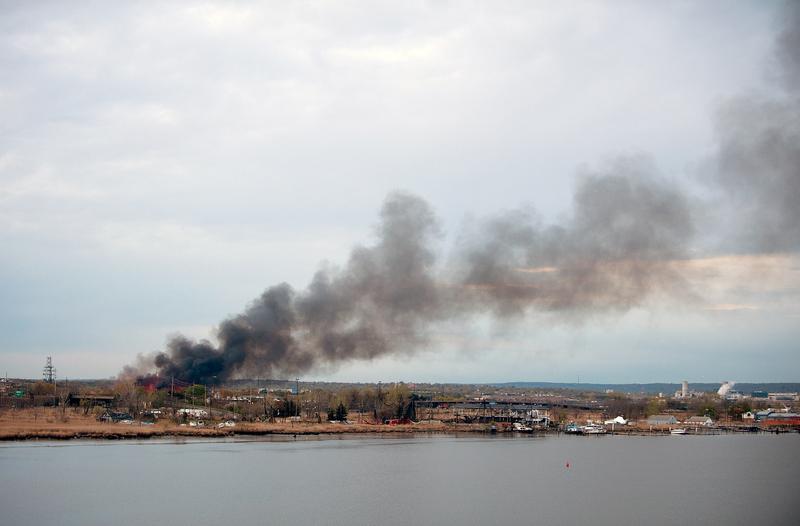 Smoke billows in the sky from a brush fire in the Meadowlands near Metlife Stadium on April 11, 2012 in Carlstadt, NJ.