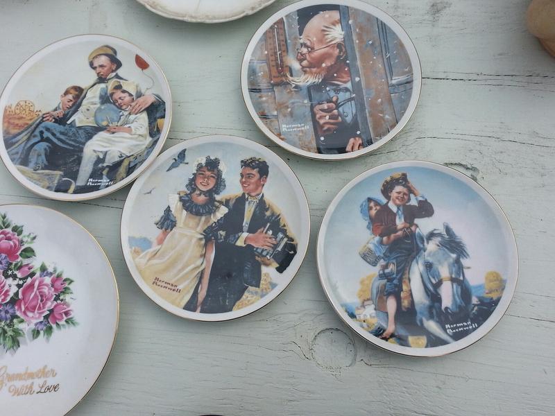Norman Rockwell plates at a garage sale in Oakland.