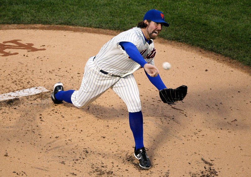 R.A. Dickey #43 of the New York Mets delivers a pitch in the first inning against the Miami Marlins at Citi Field on April 25, 2012.