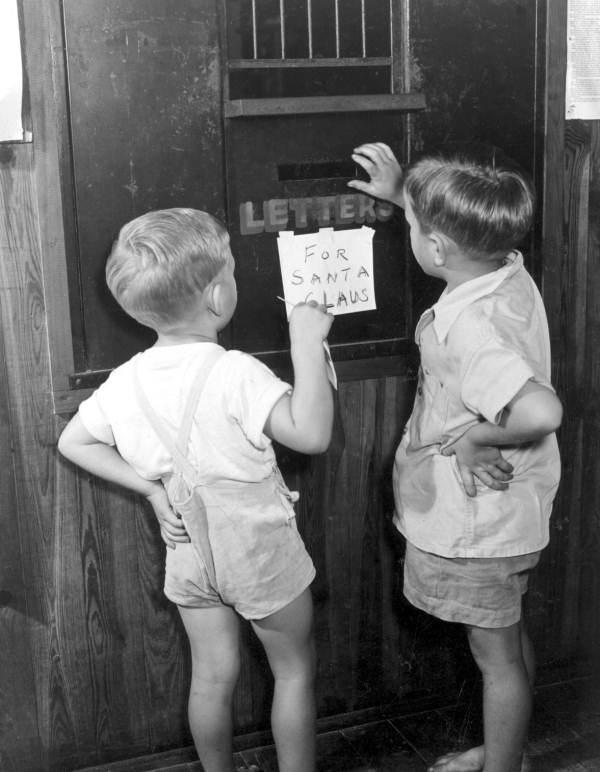Mailing letters to Santa in the special letter box, 1947.