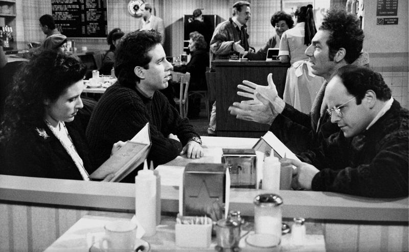 The Kiss Hello' Episode 17 -- Pictured: (l-r) Julia Louis-Dreyfus as Elaine Benes, Jerry Seinfeld as himself, Michael Richards as Cosmo Kramer, Jason Alexander as George Costanza