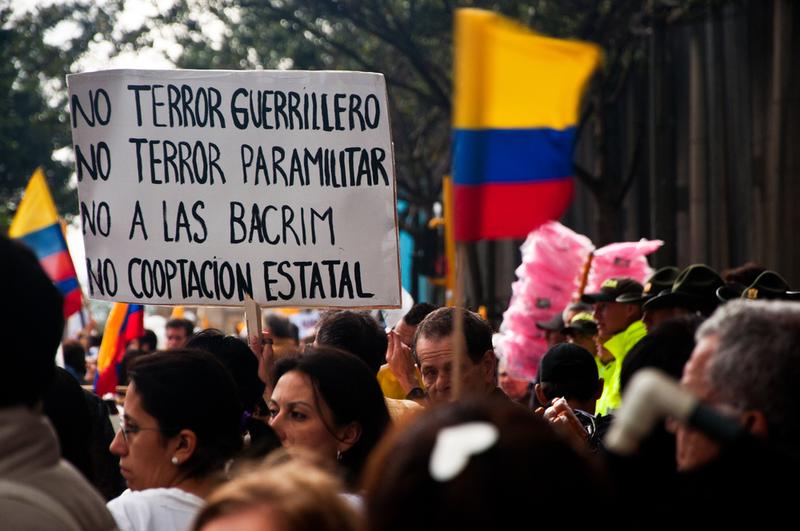 People line the streets of Bogota, Colombia to protest against the FARC on December 6, 2011.