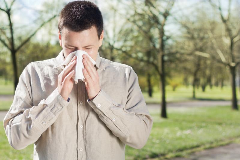 Allergies often cause sneezing.
