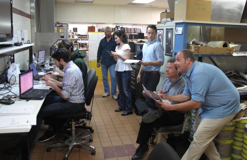 Members of Skycorp monitoring their satellite from HQ- an abandoned McDonald's