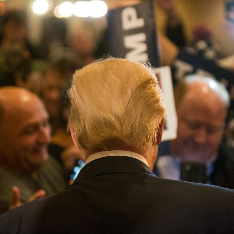 Donald Trump works a rope line after a Town Hall in NH.