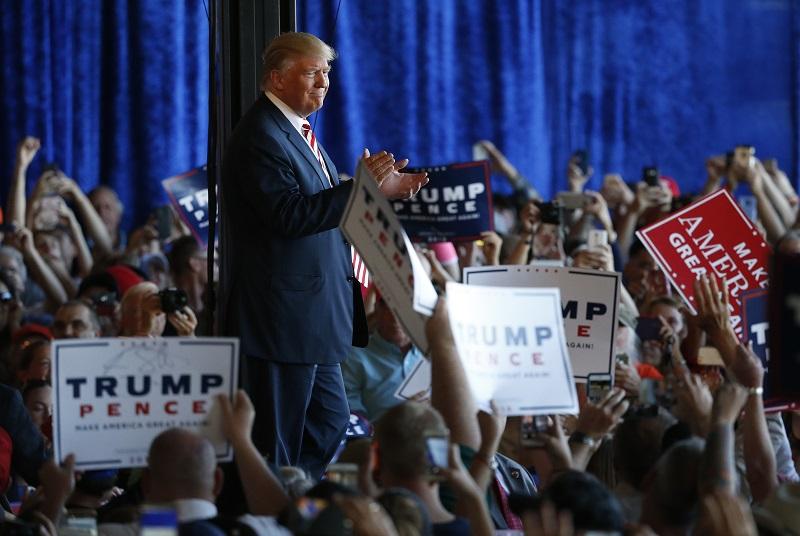 Republican presidential candidate Donald Trump says goodbye to supporters after speaking at a campaign rally, Tuesday, Oct. 18, 2016, in Grand Junction, Colo.