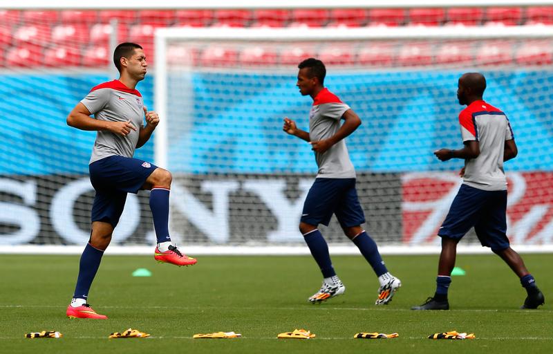 Clint Dempsey of the United States stretches during training at Arena Pernambuco on June 25, 2014 in Recife, Brazil.