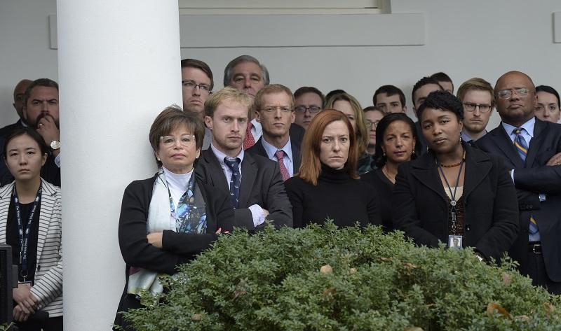Staff listen as President Barack Obama speaks about the election results, Wednesday, Nov. 9, 2016, in the Rose Garden at the White House in Washington.