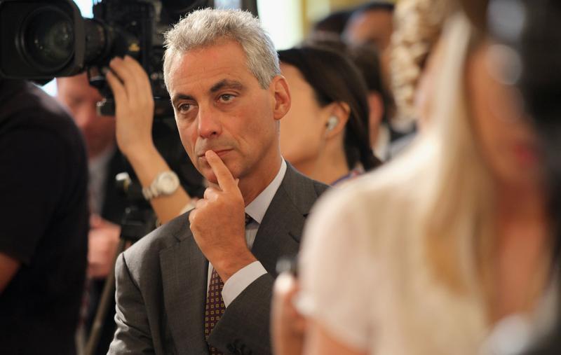 White House Chief of Staff Rahm Emanuel listens as U.S. President Barack Obama answers questions during a news conference in the East Room of the White House September 10, 2010 in Washington, DC.