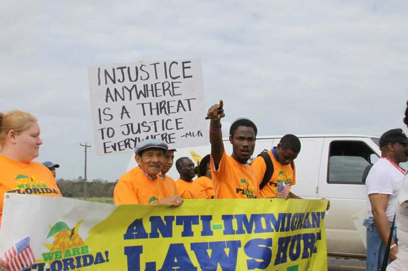 Groups opposed to Alabama's HB 56 immigration march participate in a protest.