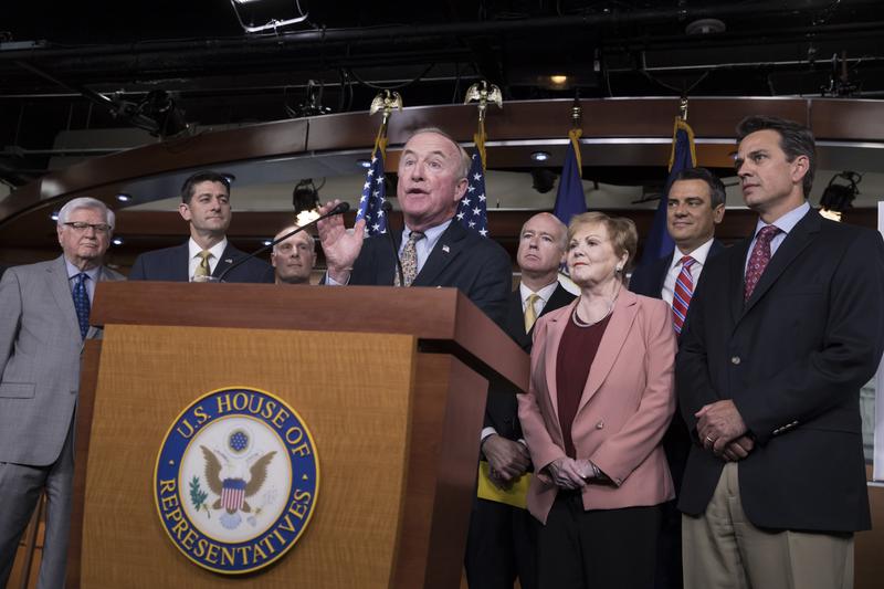 Rep. Rodney Frelinghuysen, R-N.J., chairman of the House Appropriations Committee, center, talks about the House spending plan at the U.S. Capitol Thursday.