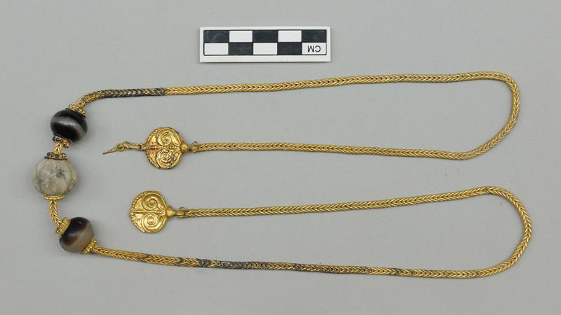 An elaborate necklace decorated with ivy leaves and measuring more than thirty inches long was found near the neck of the warrior’s skeleton.