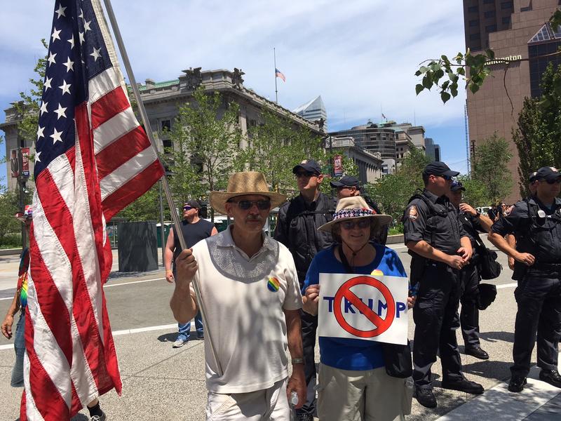 Bob and Pat from Pittsburgh drove to Cleveland to protest Donald Trump's candidacy because they 'just couldn't stay silent.' They also wore rainbow buttons that said 'Straight, but not narrow.'