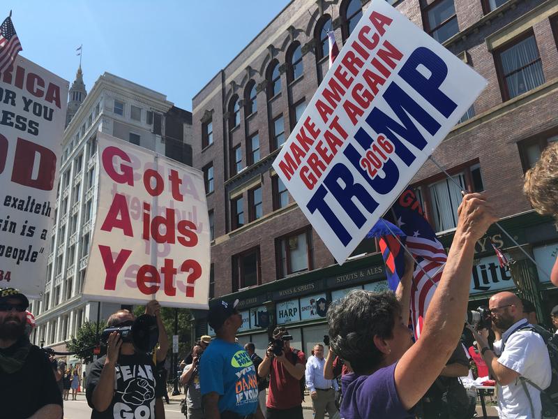 Donald Trump supporters hit the streets outside the convention headquarters in downtown Cleveland.